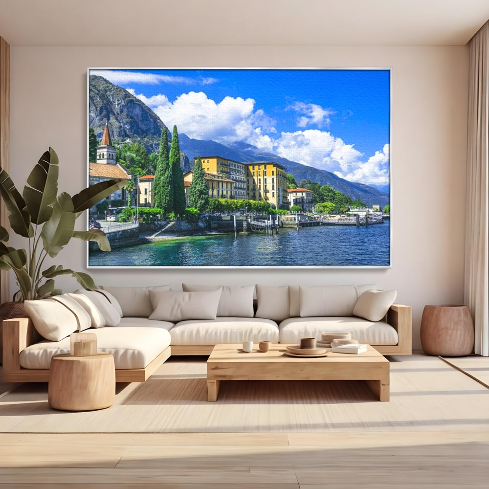 Tablou canvas cu peisaj urban pe malul lacului, in rama de aluminiu argintiu, pe perete intr-un living
